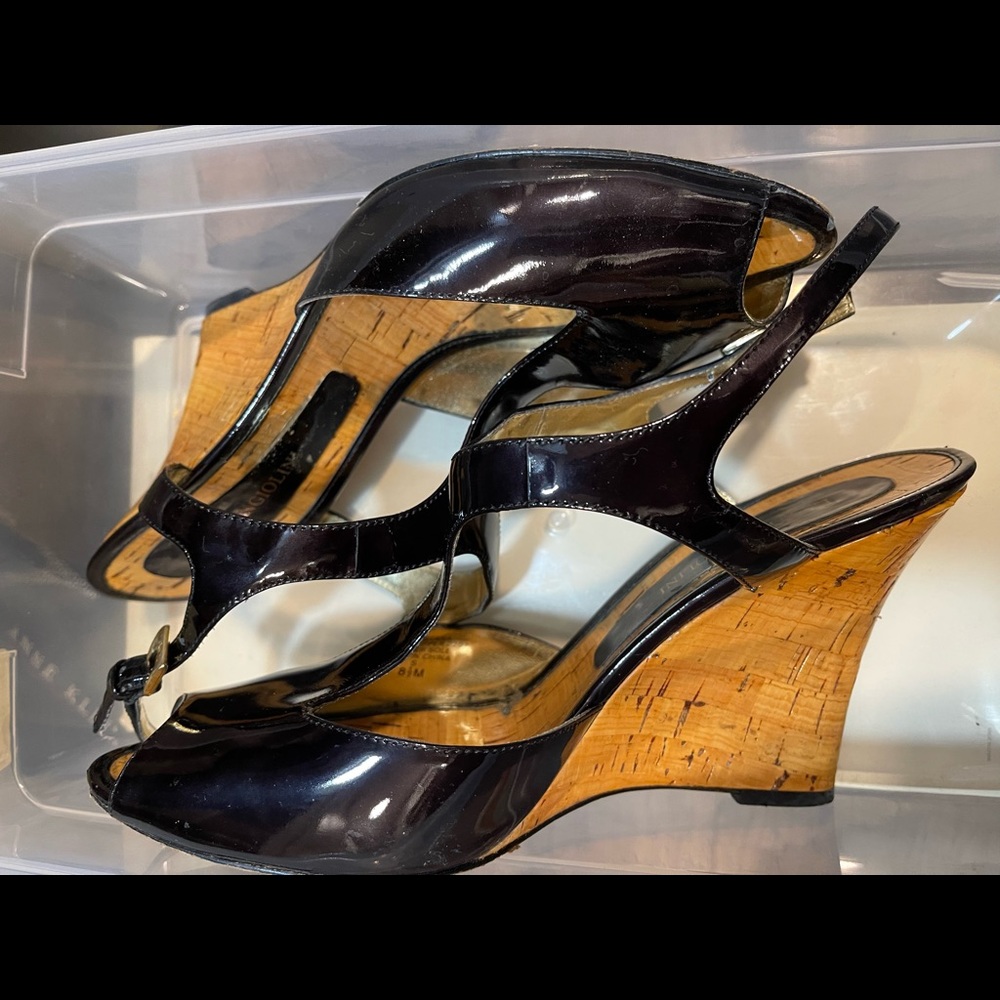 Enzo Wedge. Color is a black purple patent. Very pretty